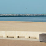 man-beach-sitting