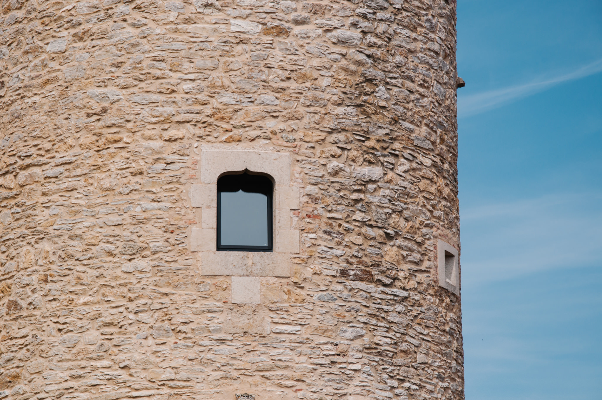 small-window-tower-stone