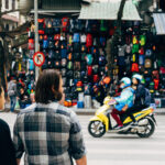 couple-crossing-scooter-hanoi-vietnam