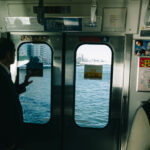 train-door-river-crossing-men