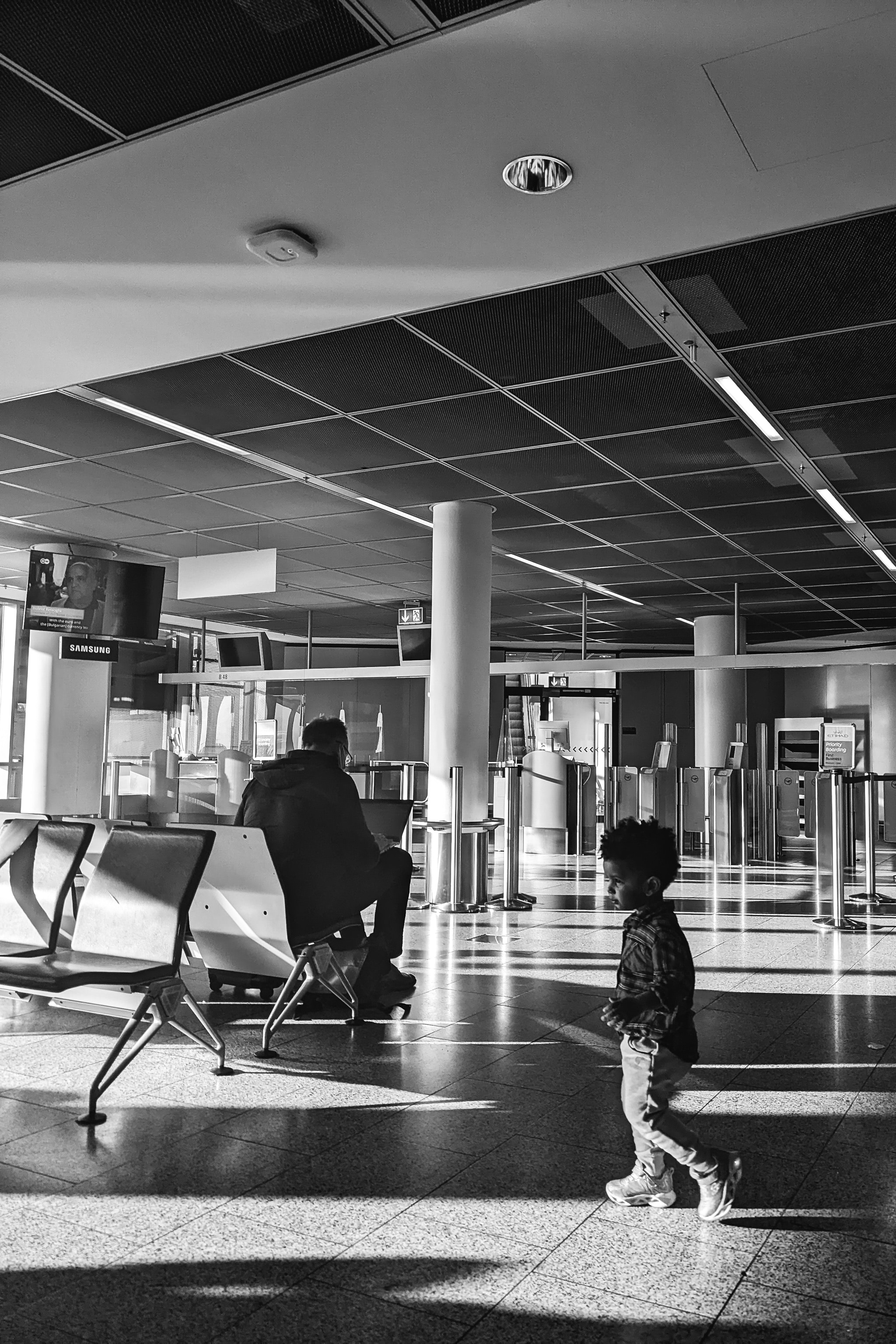 airport-playing-boy