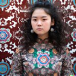 women-a-brown-curled-hair-in-a-mongolian-dress-1