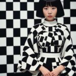 harmony_in_checks_girl_checkered_background_portrait