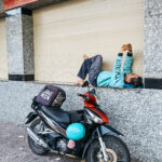 vietnam-resting-driver-food-delivery
