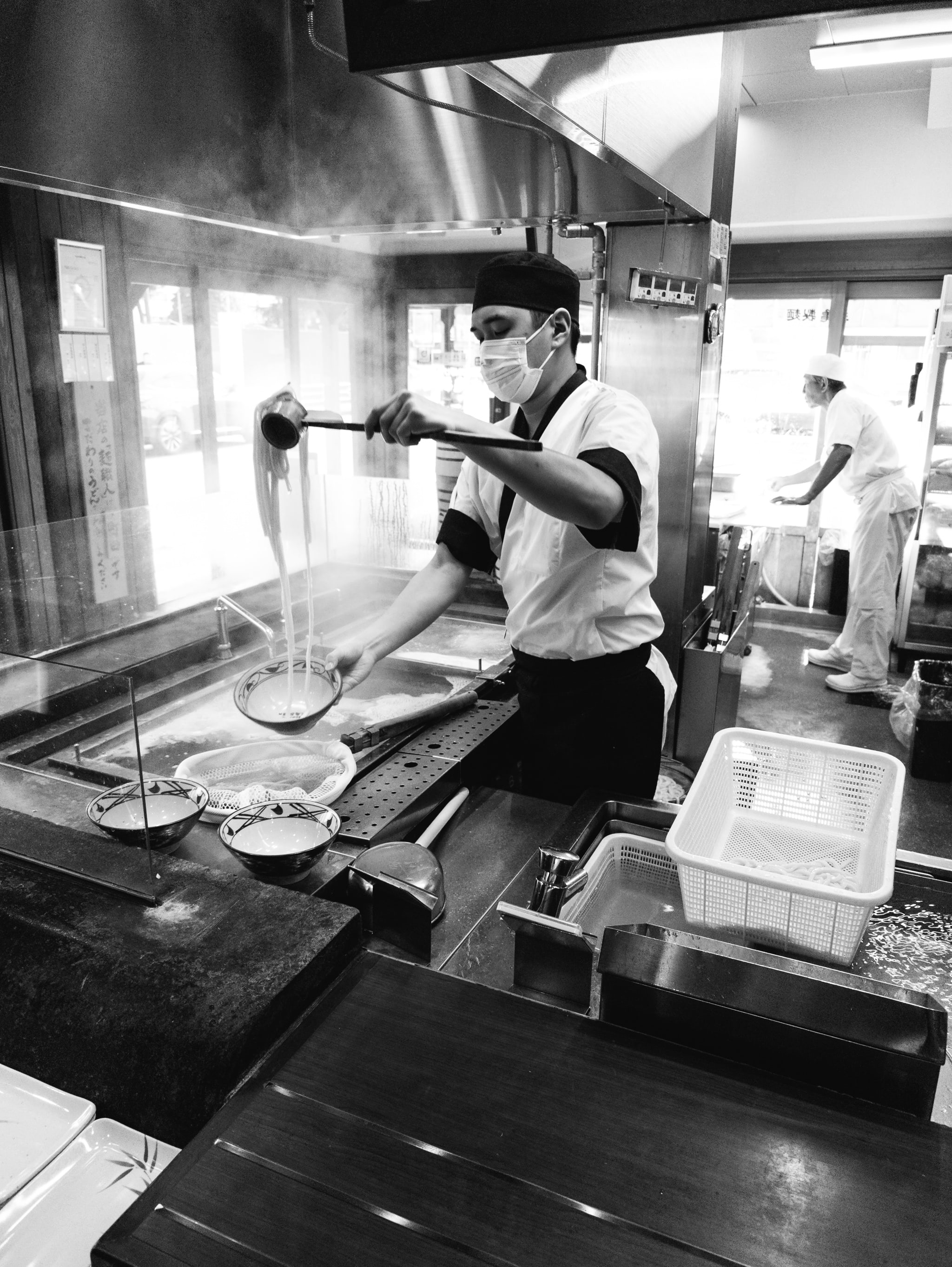 chef-cooking-commercial-kitchen-udon-noodle-restaurant