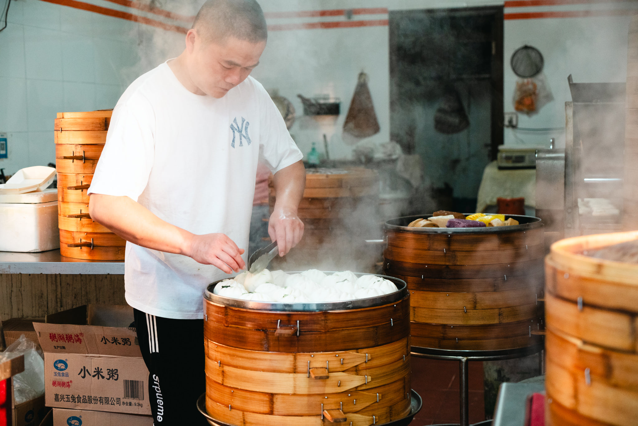 Street food vendor steaming dumplings