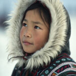 young-inuit-girl-in-winter-clothes